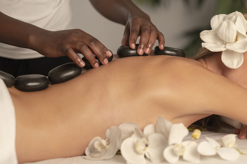 Guest enjoying a calming massage at Queen Daynight Out Spa Rajkot