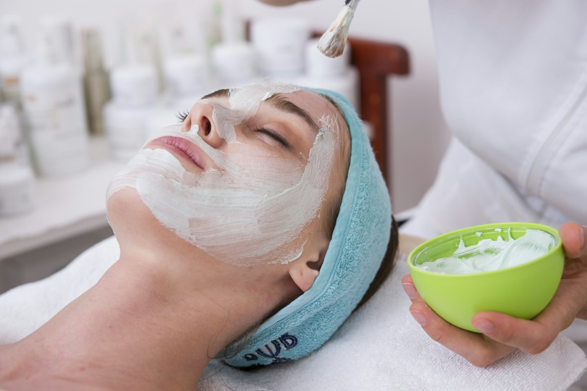 Relaxing facial mask treatment at the spa